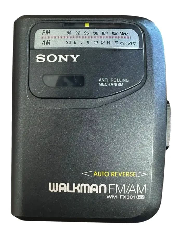 A Sony WM-FX301 Walkman, with an FM and AM frequency scale across the top